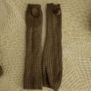 Soft, stretchy leg warmers with pom poms